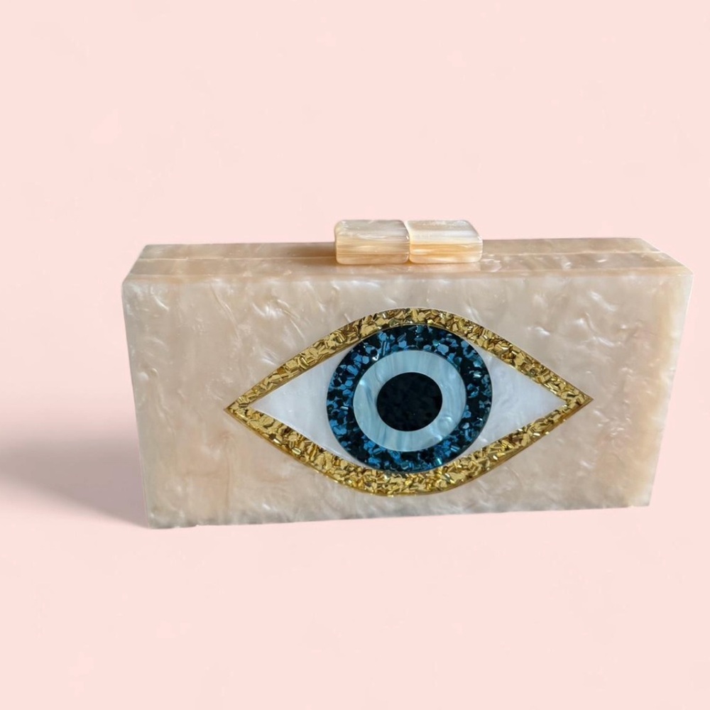 Elegant Cream Acrylic Clutch with Eye Design
